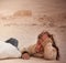 Bedouin girl at the ruins of the ancient city of Palmyra, Syria