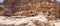 Bedouin houses at historical site of Petra, next to the Nabatean theatre, in the street of facades.