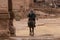 Bedouin riding a Camel in Petra, Jordan