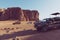 Bedouin`s car jeeps and tourists, Wadi Rum desert in Jordan, Middle East