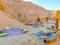 Bedouin village in Sahara desert on mountain landscape