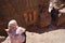 Bedouin woman watching from temple treasury of Pet