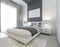 Bedroom in Art Deco style in white and gray colors.