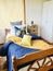 Bedroom interior design with yellow and blue as the main tone.