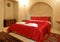 Bedroom layout red bedspread
