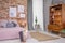 Bedroom with old wooden bookcase