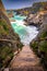 Bedruthan Steps in North Cornwall is a stunning coastline with the waves crashing against the rocks a beautiful landscape