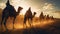 Beduin\\\'s caravan in African desert at sunset