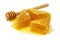 Bee combs with honey isolated on a white background. A flowing sweet dessert. A portion of a healthy and healing treat