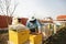 Bee hive detail. Beekeeper Inspecting Bee Hive after winter