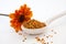 Bee Pollen Granules and Orange Flower