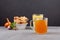 Beef Bone Broth in Glasses on dark background, selective focus. Bones contain collagen, which provides body with amino acids,