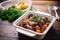 beef bourguignon packed as a gourmet to-go meal