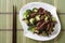 Beef with broccoli and chopsticks. horizontal view from above