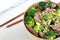 Beef and Broccoli with ginger in wooden bowl. Traditional chinese recipe