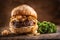 Beef burger with melted cheese, caramelized onions in a sesame bun with salad on the side