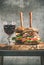 Beef burgers with barbeque sauce and red wine, vertical composition