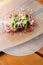 Beef carpaccio appetizer with baby asparagus