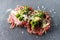 Beef carpaccio appetizer with baby asparagus