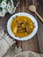 beef curry on a floral bowl served during eid or iftar ramadan