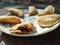 Beef Empanada on Ceramic Plate from Side