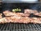 Beef fajita and jalapenos grilling.