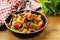 Beef Fajitas with colorful bell peppers in pan