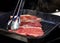 Beef fillet on grill , Beef steaks being prepared on grill , cooking meat steaks on kitchen