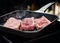 Beef fillet on grill , Beef steaks being prepared on grill , cooking meat steaks on kitchen