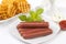 Beef franks with mayonnaise ketchup and fries