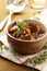 Beef goulash (stew) with vegetables and herbs