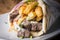 Beef gyros Greek style wrap in pita bread with french fries