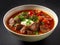 Beef Kharcho Soup with Tomatoes on a Rustic Wooden Background. Gourmet Comfort.AI Generative