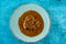 Beef masala curry in a plate isolated on background top view of indian, pakistani and bangali food