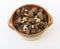 Beef meat cubes with pine in a bowl , Diced veal in a bowl  on white