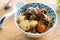 Beef noodle soup. Taiwanese famous food in a bowl on wooden table