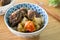 Beef noodle soup. Taiwanese famous food in a bowl on wooden table