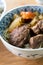 Beef noodle soup. Taiwanese famous food in a bowl on wooden table