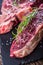 Beef raw steak. Raw fresh T-bone steak with salt pepper and rose