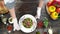 Beef salad on wooden background.