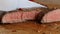 Beef steak cooked medium well cut sliced knife