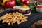 Beef steak with egg and salad from greens and vegetables. Wooden background, table setting, fine dining