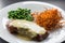 Beef steak with green peas and sweet potato