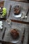 Beef steak grilled on a glass plate. Glass of wine, vegetables