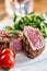 Beef Steak. Juicy beef steak. Gourmet steak with vegetables and glass of rose wine on wooden table