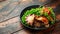 Beef steak pies with rich onion gravy served with sweet peas and salad