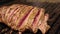 Beef steaks on the grill with smoke. Cooked, appetizing meat in a grilled smoker, barbecue.