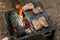 Beef steaks grilling on a cast iron plate on a camp fire