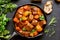 Beef stew, goulash in cast iron pan