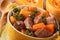 Beef stew with pumpkin macro in a pot. Horizontal